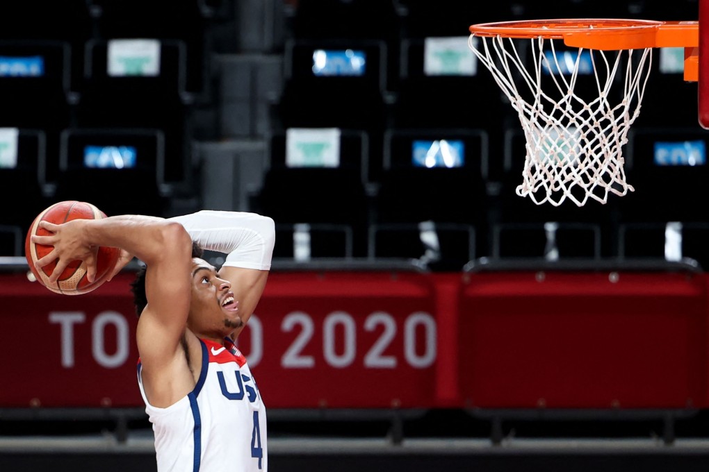 USA's Keldon Johnson goes for a dunk. Photo: AFP