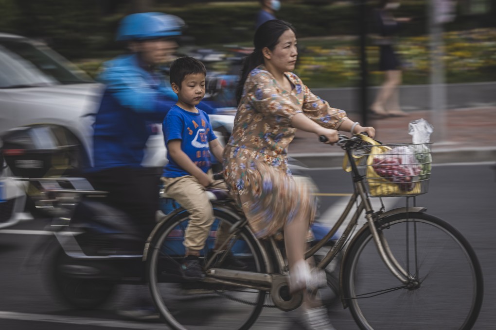 Structural and social barriers in Chinese society continue to challenge mothers in their quest to level the corporate playing field. Photo: EPA-EFE