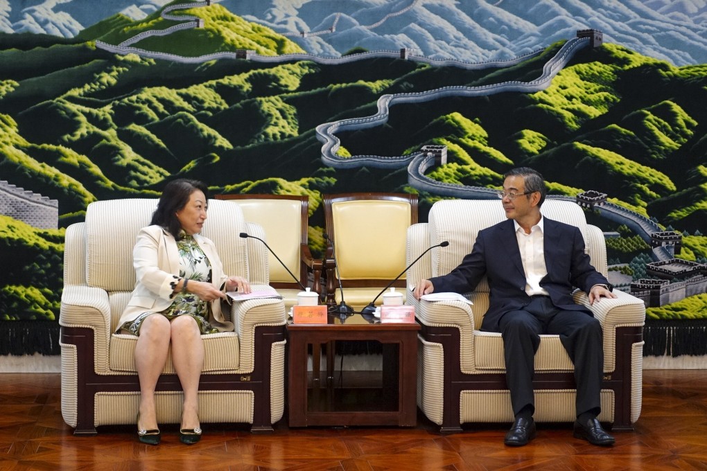 Teresa Cheng meets Supreme People’s Court president Zhou Qiang in Beijing. Photo: SCMP Pictures