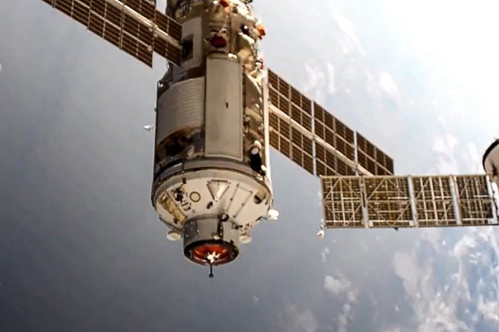 The Russian Nauka laboratory module docks at the International Space Station on Thursday. Photo: Roscosmos handout via AFP