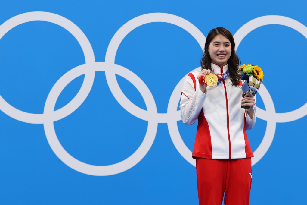 China’s Zhang Yufei poses on the podium with her gold medal from the 200m butterfly. Photo: REUTERS