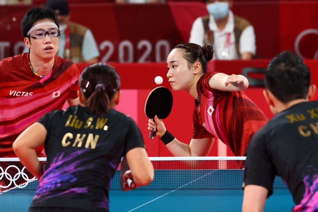 Japan’s Mima Ito and Jun Mizutani in action against China’s Xu Xin and Liu Shiwen. Photo: Reuters