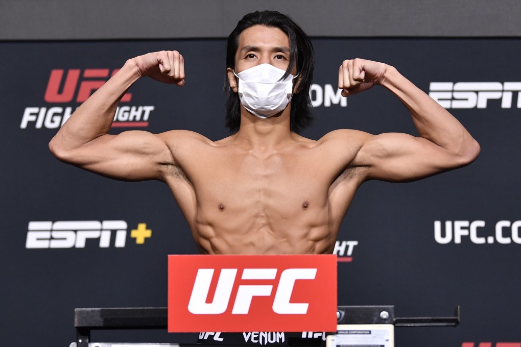 Kang Kyung-ho of South Korea poses on the scale during the UFC Vegas 33 weigh-ins. Photos: Chris Unger/Zuffa LLC