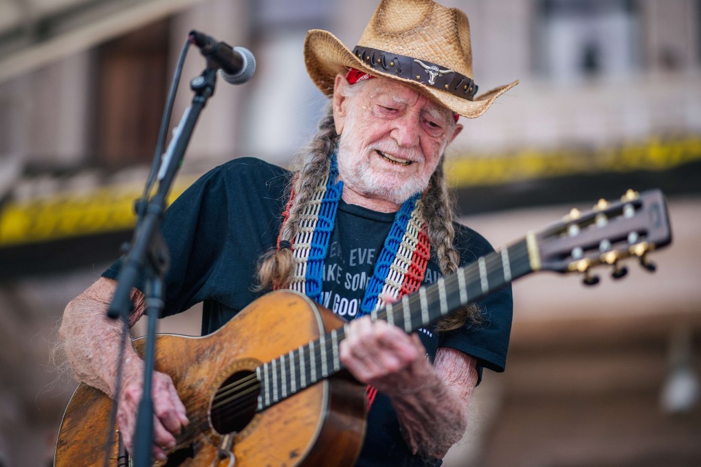 Musician Willie Nelson performs during the Georgetown to Austin March for Democracy rally on Saturday in Austin, Texas. Photo: Getty Images / AFP