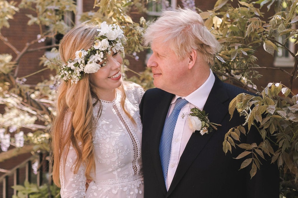 Britain’s Prime Minister Boris Johnson and his wife Carrie Johnson on their wedding day in May. Carrie Johnson posted on Instagram on Saturday that the couple are expecting their second child. Photo: Rebecca Fulton / 10 Downing Street / AFP