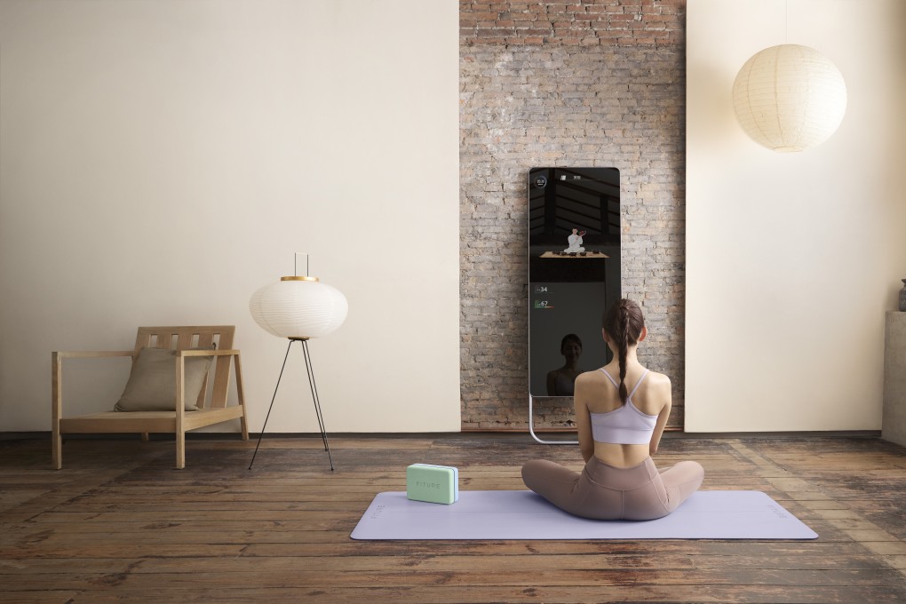 Fiture’s mirror-like workout screens offer interactive classes and customised training programmes. Photo: Handout
