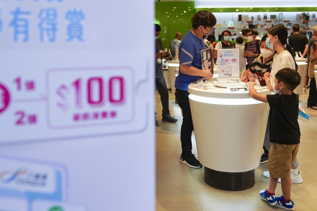 People shop in a store in Mong Kok on Monday, a day after Hongkongers received their first instalment of government e-vouchers. Photo: Sam Tsang