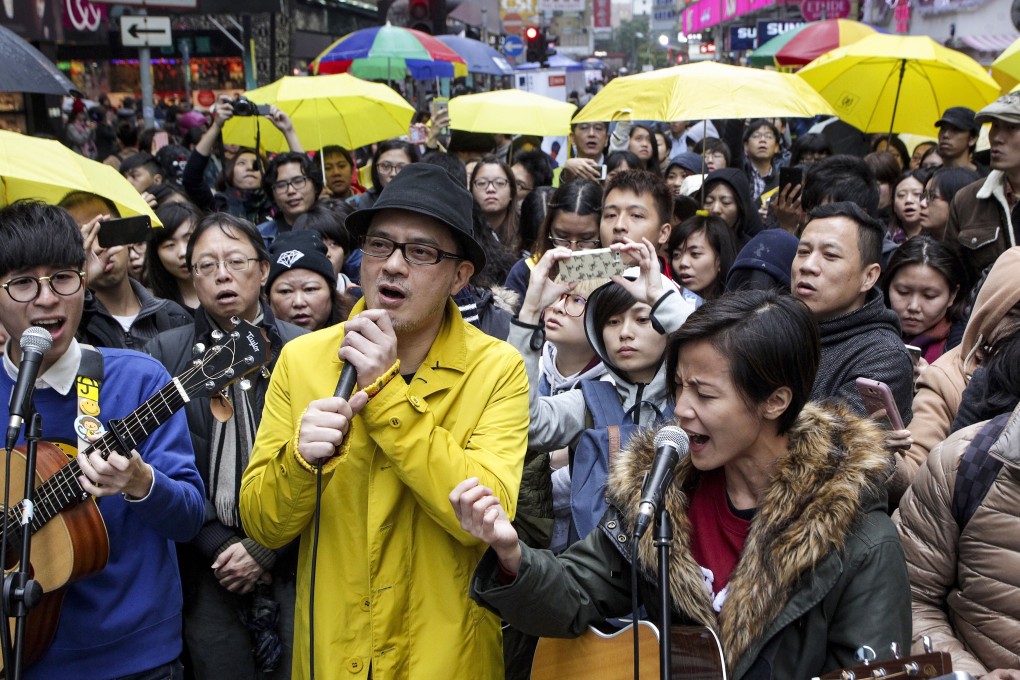 Anthony Wong, pictured alongside fellow singer Denise Ho, performing in 2014. Photo: SCMP