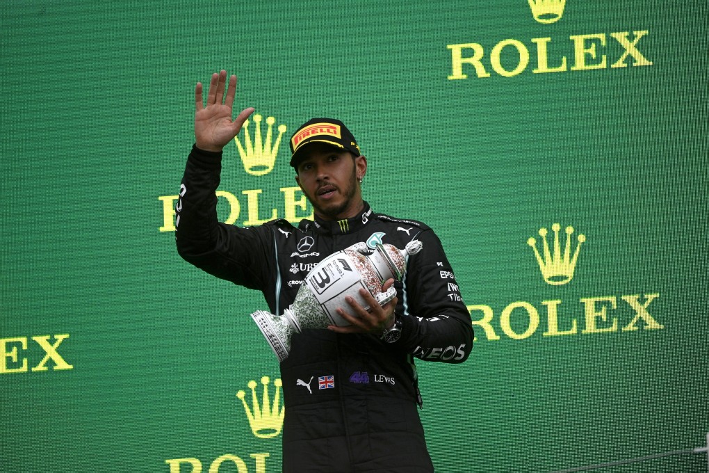 British Formula One driver Lewis Hamilton on the podium after taking the third place in the Formula One Grand Prix in Mogyorod, near Budapest, Hungary, on Sunday. Photo: EPA-EFE