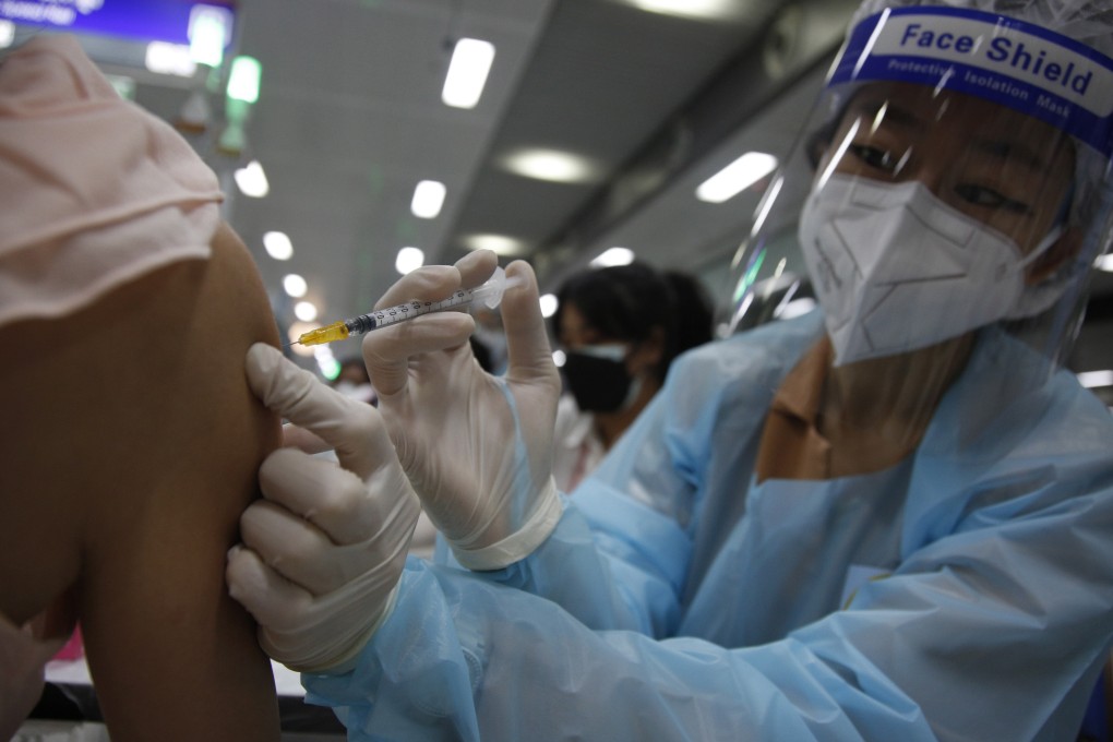 A Thai health worker administers an AstraZenca Covid-19 vaccine in Bangkok. Photo: EPA