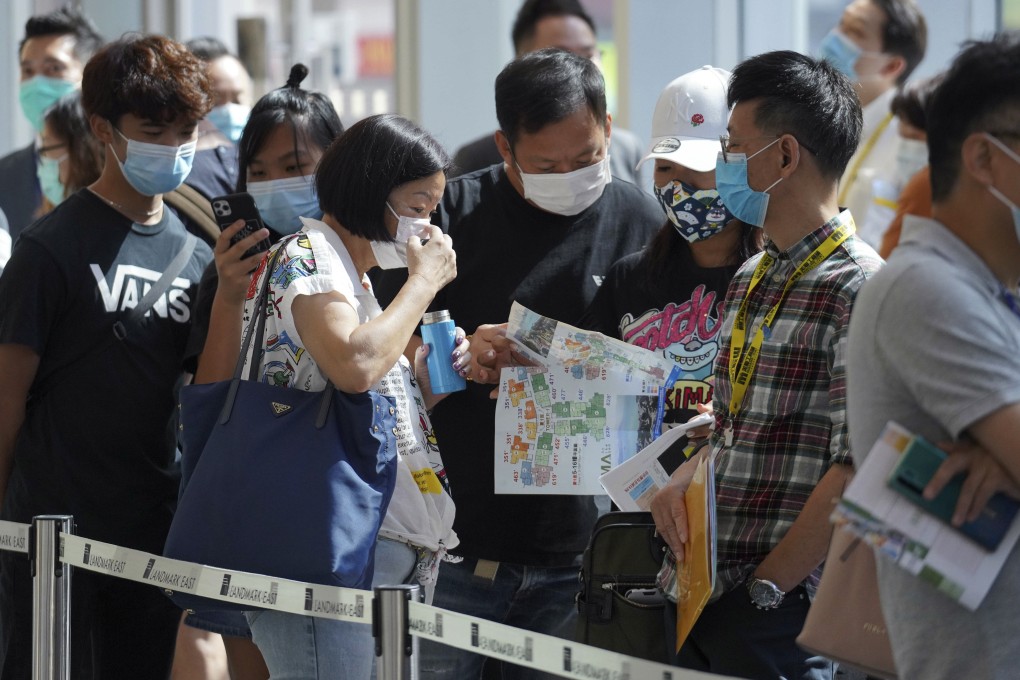 Potential buyers queue up to buy flats at Wing Tai Properties’ OMA by the Sea project in Tuen Mun, in May 2020. Photo: Winson Wong
