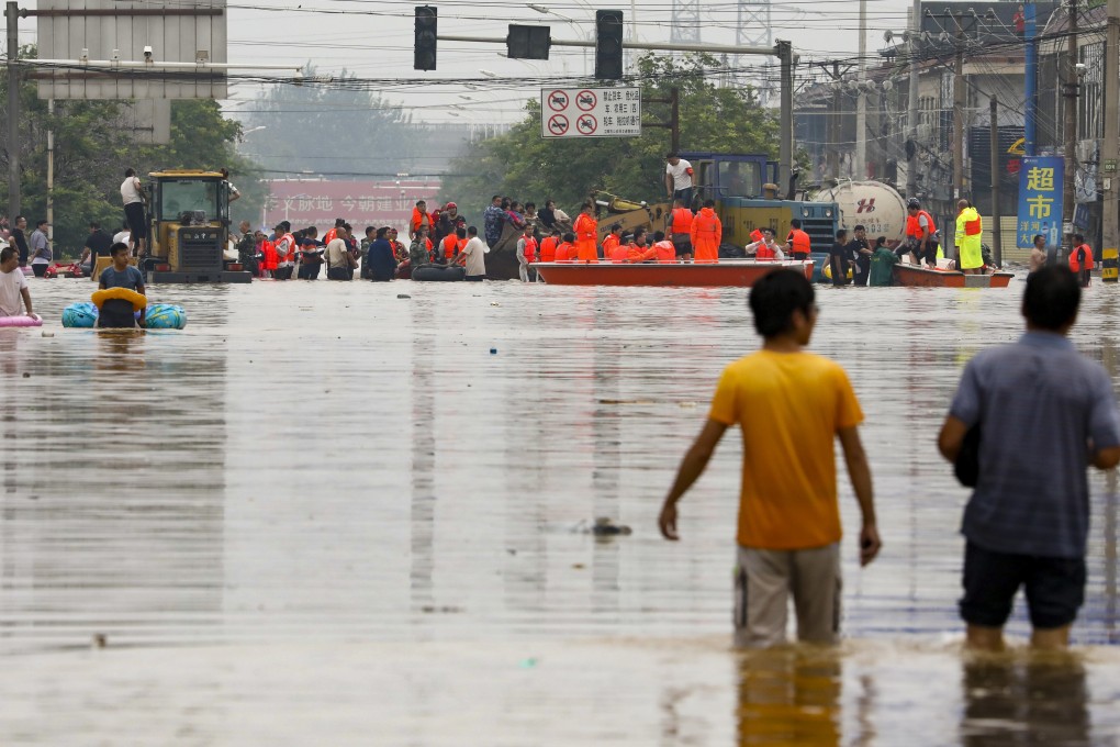 Floods have stranded thousands of people in Xinxiang, Henan province. Photo: Simon Song