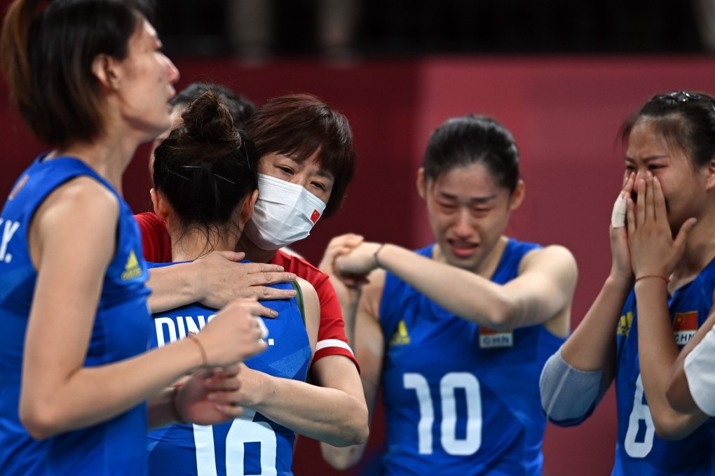 China head coach Lang Ping hugs her players after the team’s win over Argentina. Photo: Xinhua