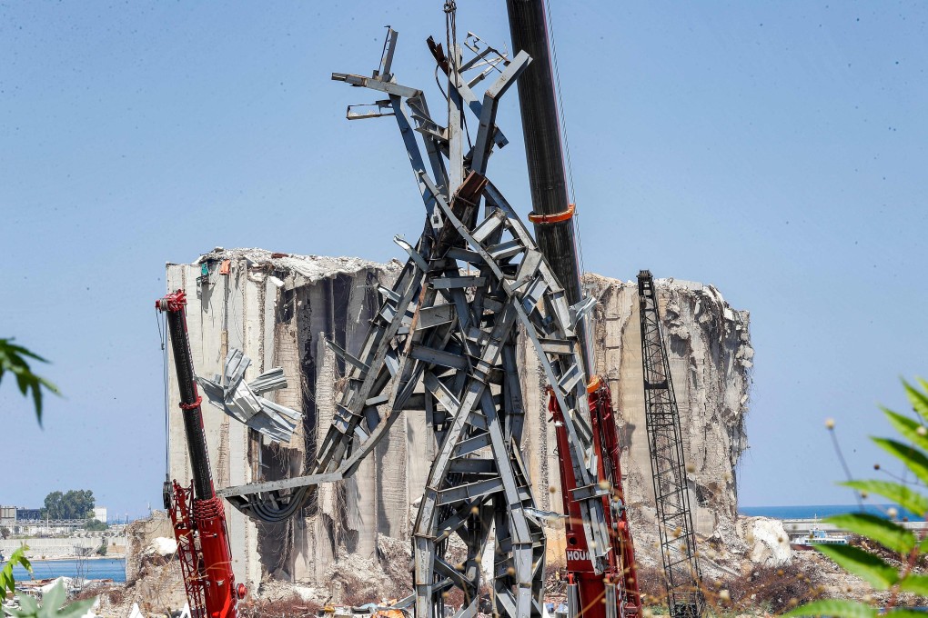 A 25-metre-tall steel sculpture named ‘The Gesture’, made from debris resulting from the aftermath of the blast at the port of Lebanon’s capital Beirut on August 4, 2020. Photo: AFP