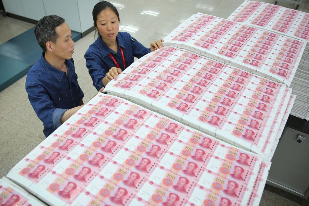 China’s central bank cut the reserve requirement ratio (RRR) for major commercial banks by 0.5 percentage points, releasing 1 trillion yuan (US$154 billion) worth of liquidity into the interbank system, in July. Photo: AFP