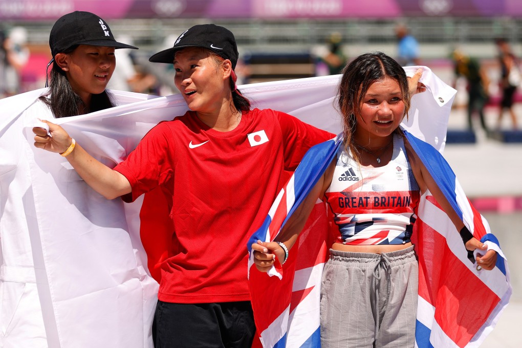 Japan‘s Kokona Hiraki (silver), Japan’s Sakura Yosozumi (gold) and Britain’s Sky Brown (bronze) celebrate their medals after the women’s skateboarding park final at the Tokyo Olympics. Photo: Gettyimages