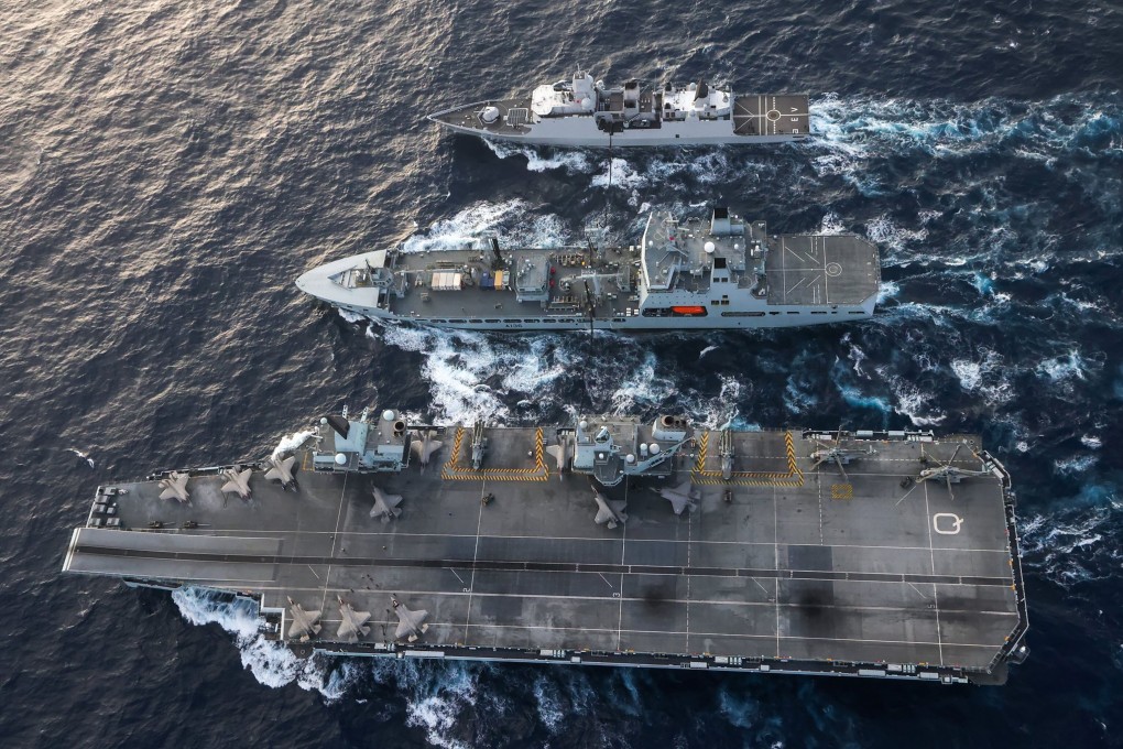 The HMS Queen Elizabeth conducts an exercise with US Navy ships in the South China Sea on Thursday. Photo: Twitter