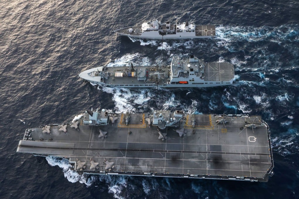 The HMS Queen Elizabeth conducts an exercise with US Navy ships in the South China Sea on Thursday. Photo: Twitter