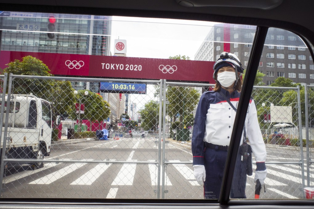 A security officer stands guard at the gate of a Tokyo Olympics event, as Japan continues its state of emergency during the Covid-19 pandemic. Photo: Bloomberg