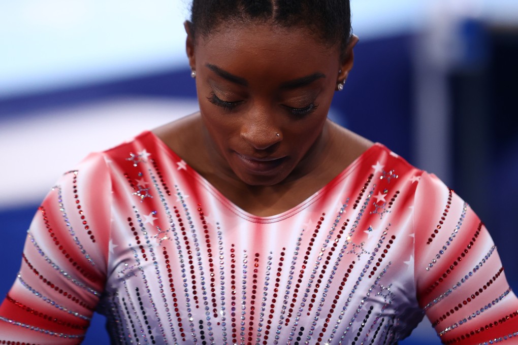 Simone Biles of the United States reacts after performing on the balance beam at the Tokyo 2020 Olympics on August 3. Photo: Reuters