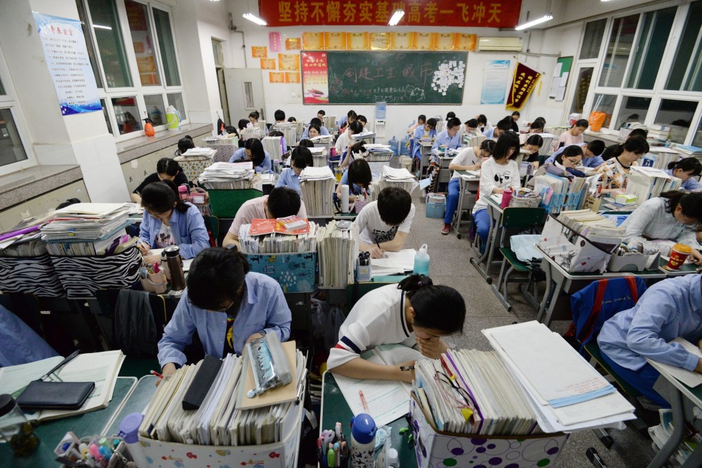 Chinese high school students study late for the annual 'Gaokao' or college entrance examinations in Handan, Hebei Province, China, in May 2018. Photo: EPA-EFE