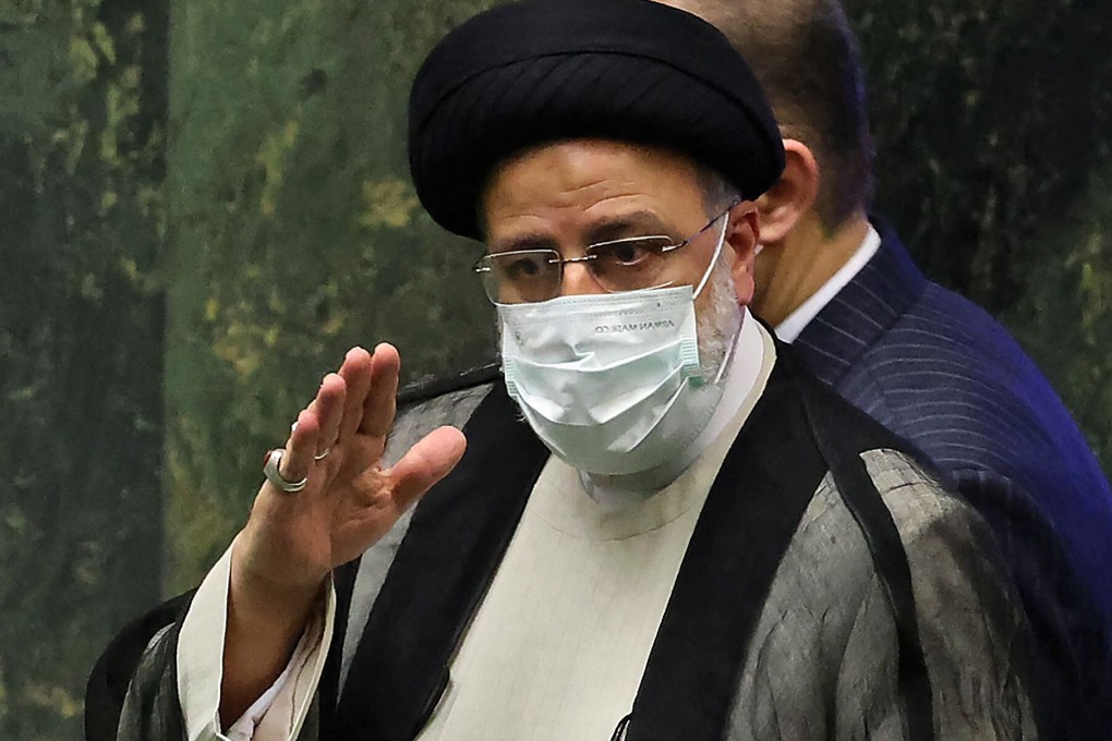 Iran President Ebrahim Raisi arrives for his swearing in ceremony at the Iranian parliament on August 5, 2021. Photo: AFP