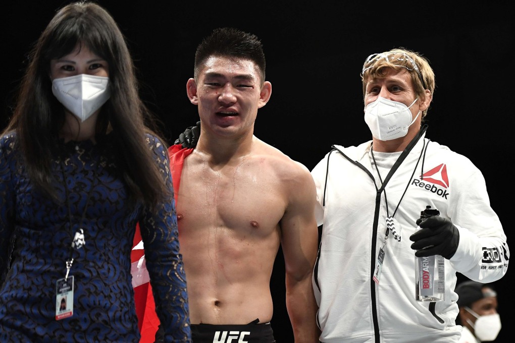 China’s Song Yadong walks backstage after defeating Marlon Vera. Photo: AFP