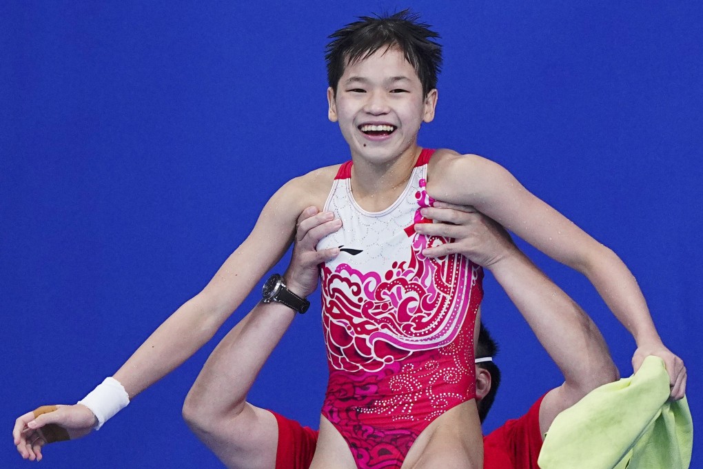 Quan Hongchan of China celebrates after winning the women's 10m platform final at the Tokyo 2020 Olympic Games. Photo: Xinhua