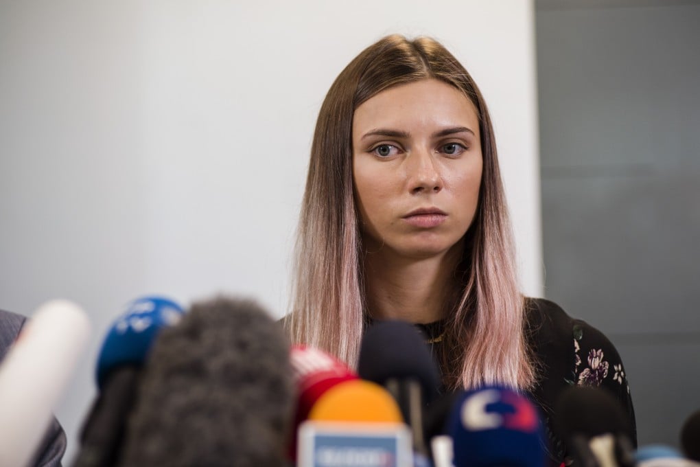 Belarusian sprinter Krystsina Tsimanouskaya speaks during a press conference in Warsaw after arriving in Poland on Wednesday evening. Photo: DPA