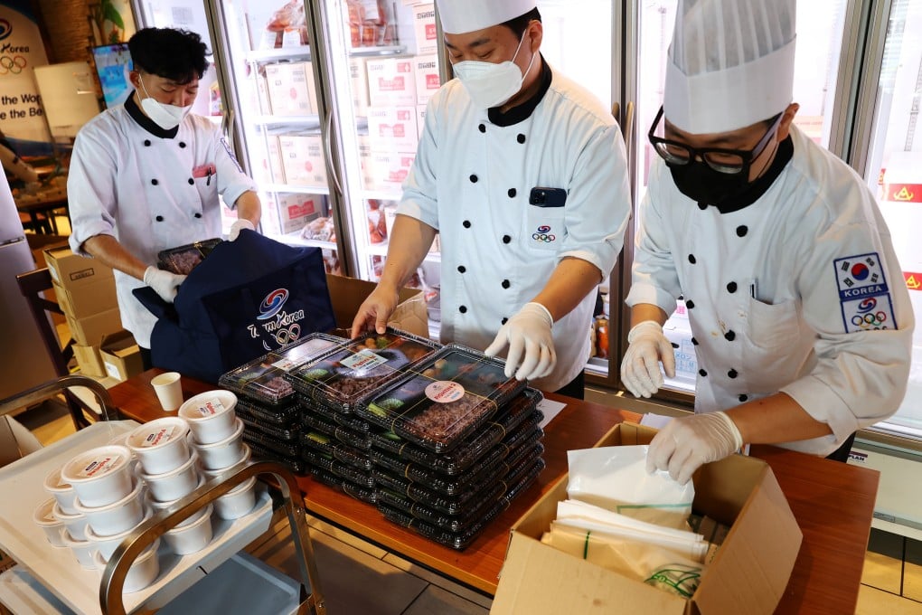Chefs dispatched from South Korea prepare boxed meals for the country‘s Tokyo 2020 Olympic Games delegation at a hotel in Japan rented out for their sole use. Photo: Reuters