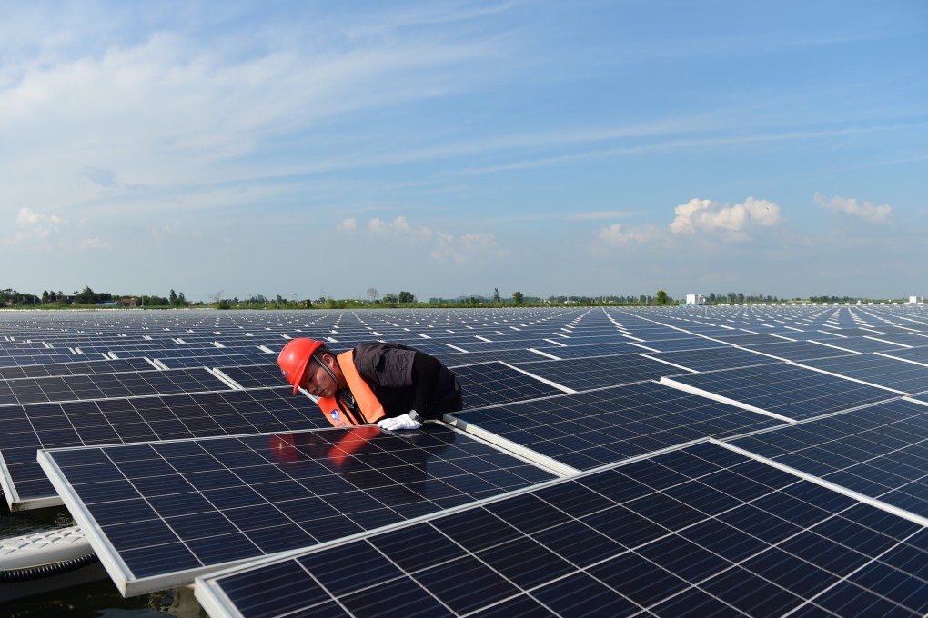An engineer conducts maintenance work at a floating solar farm in Huainan City, in east China’s Anhui Province. Photo: Xinhua