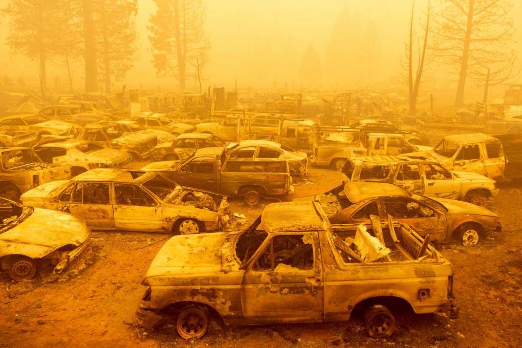 Dozens of burned vehicles rest in heavy smoke in Greenville, California. Photo: AFP