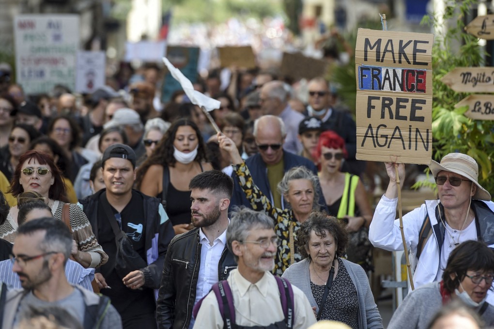 Demonstrators in Nantes, France during a national day of protest against the compulsory Covid-19 vaccination for certain workers and the mandatory use of the health pass on Saturday. Photo: AFP