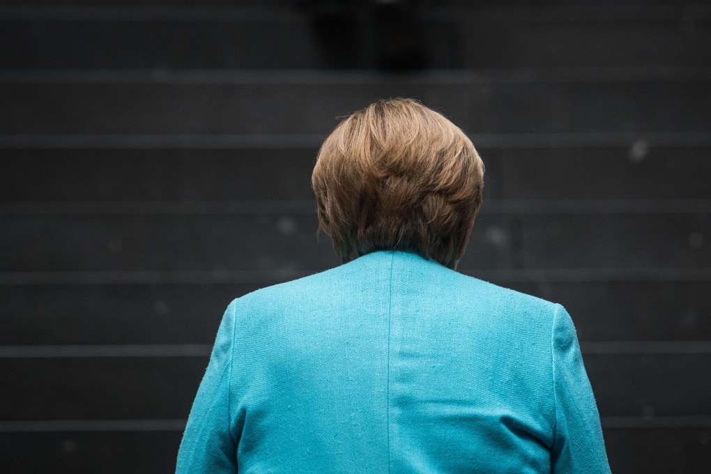 German Chancellor Angela Merkel arrives for a press conference in Berlin on July 22. She will not be seeking a fifth term in 2021. Photo: AFP