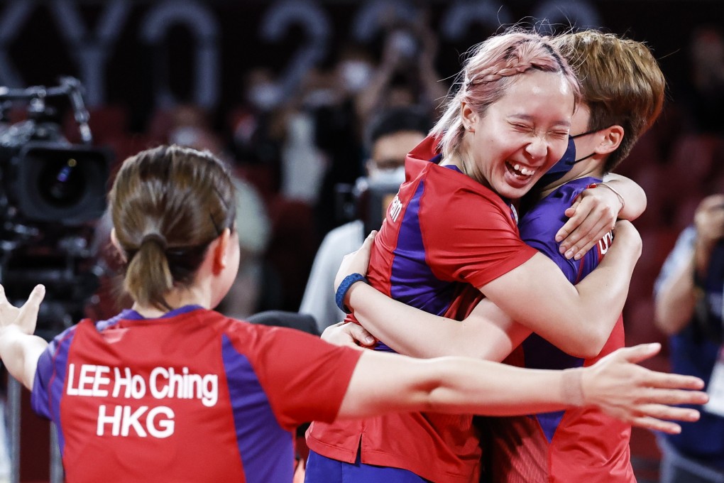 Hong Kong’s Lee Ho-ching, Minnie Soo Wai-yam and Doo Hoi-kem celebrate after winning the table tennis women's team bronze medal match against Germany at the Tokyo Olympics. Photo: EPA-EFE