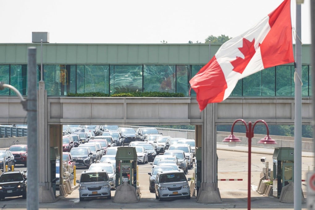 Motorists wait to cross into Canada at the Rainbow Bridge in Niagara Falls, Ontario, on Monday. Photo: AFP