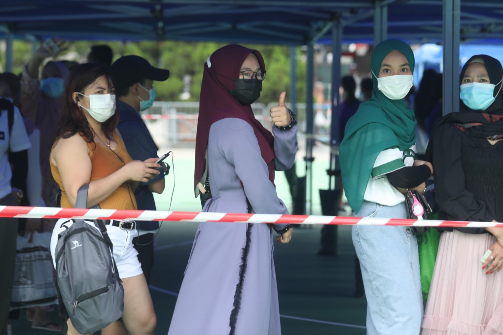 Hong Kong has 370,000 domestic helpers, but many are stranded overseas and unable to return to the city. Photo: Xiaomei Chen