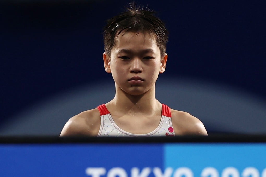 Quan Hongchan looks on from the platform ahead of a dive during the 10m platform final at the Tokyo Olympics. Photo: Reuters