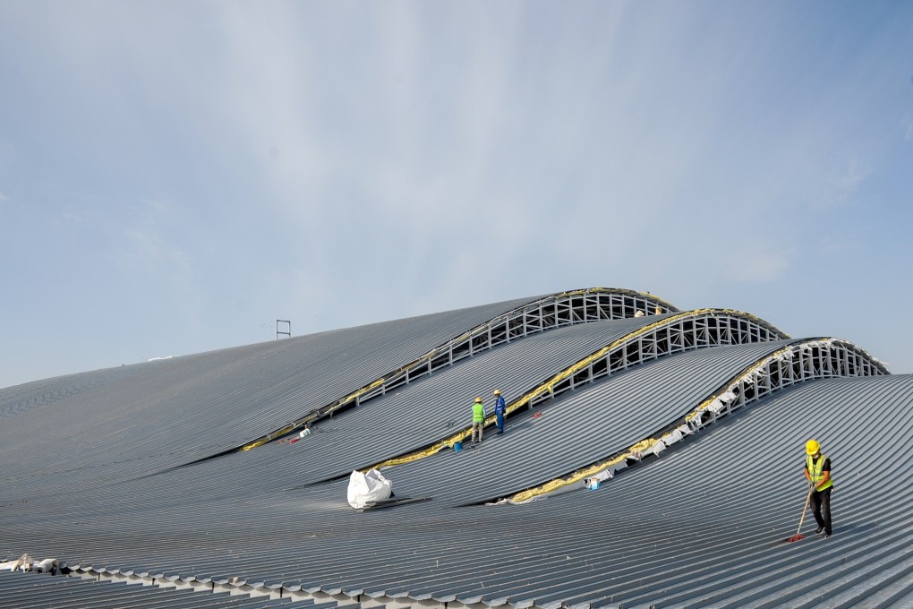 Workers at the construction site for the expansion project of the international airport in Kashgar, in northwest China’s Xinjiang Uygur autonomous region, on August 7. Photo: Xinhua