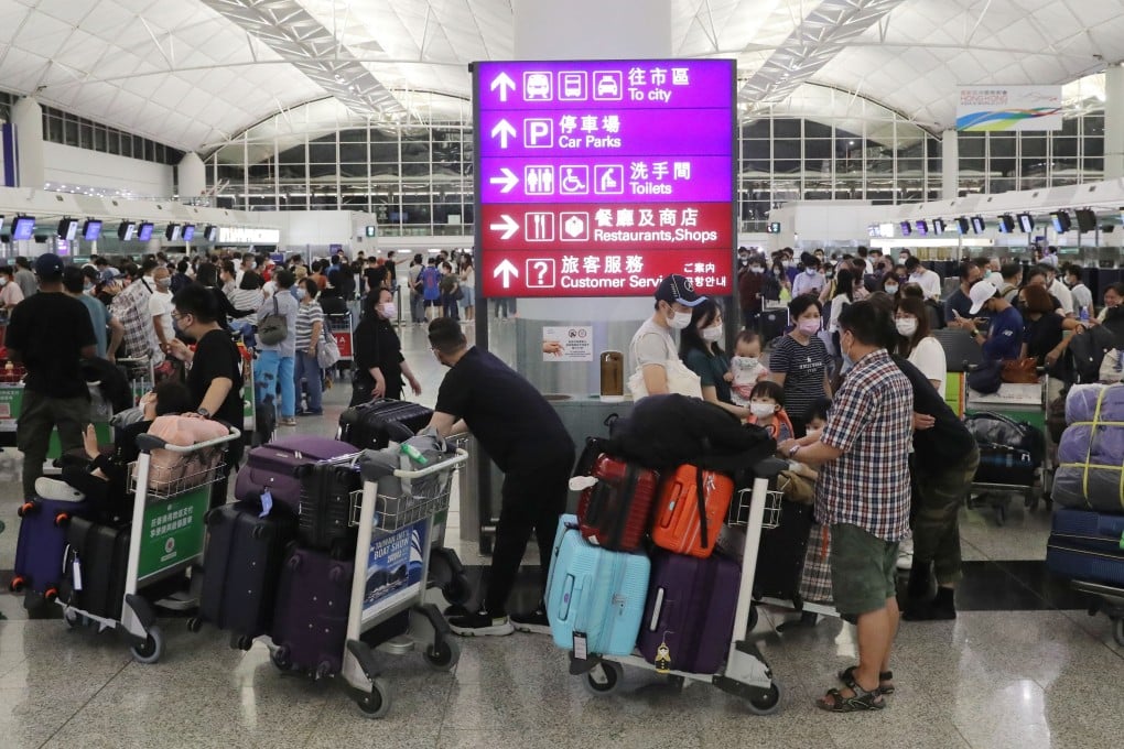 Passengers wait at check-in counters at Hong Kong International Airport. Photo: Edmond So