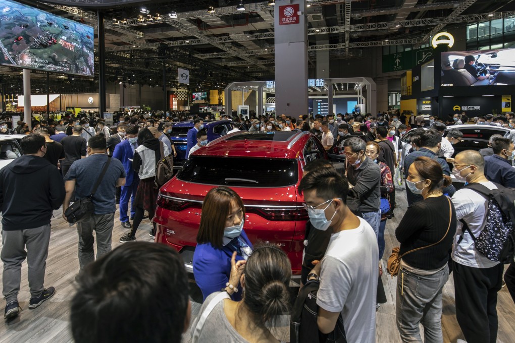 Visitors look at BYD’s electric vehicle displayed at the Auto Shanghai 2021 in April. Photo: Bloomberg
