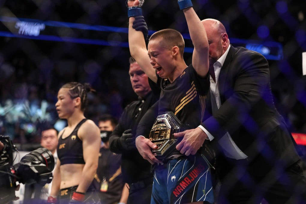 Rose Namajunas celebrates after beating Zhang Weili to claim the strawweight title at UFC 261. Photo: AFP