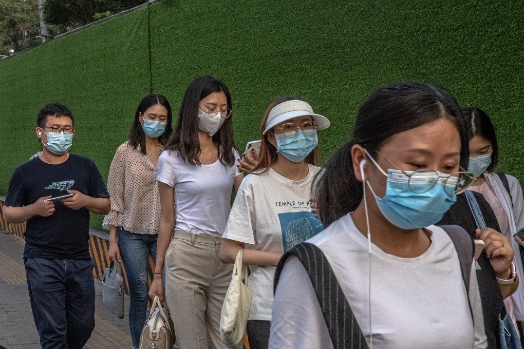 China's National Health Commission has introduced stricter mask-wearing guidelines as the country battles its latest Covid-19 outbreak. Photo: EPA-EFE