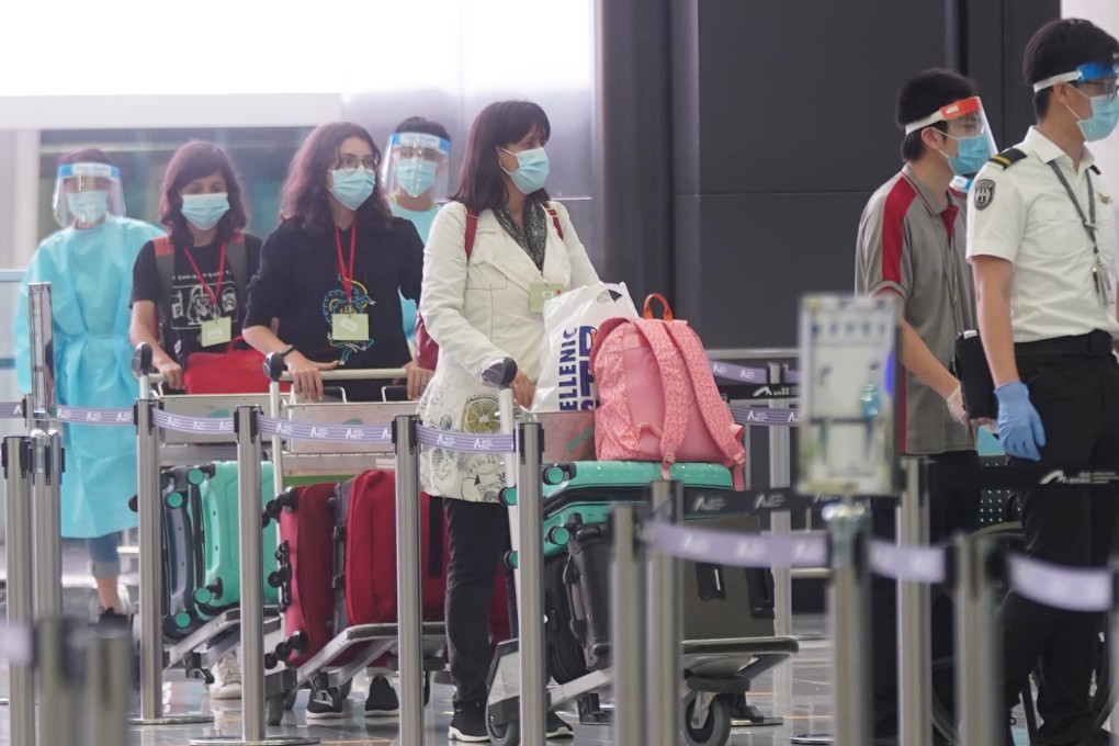 Travellers at the arrival hall of the Hong Kong International Airport, on Aug 3, 2021. Photo: Sam Tsang