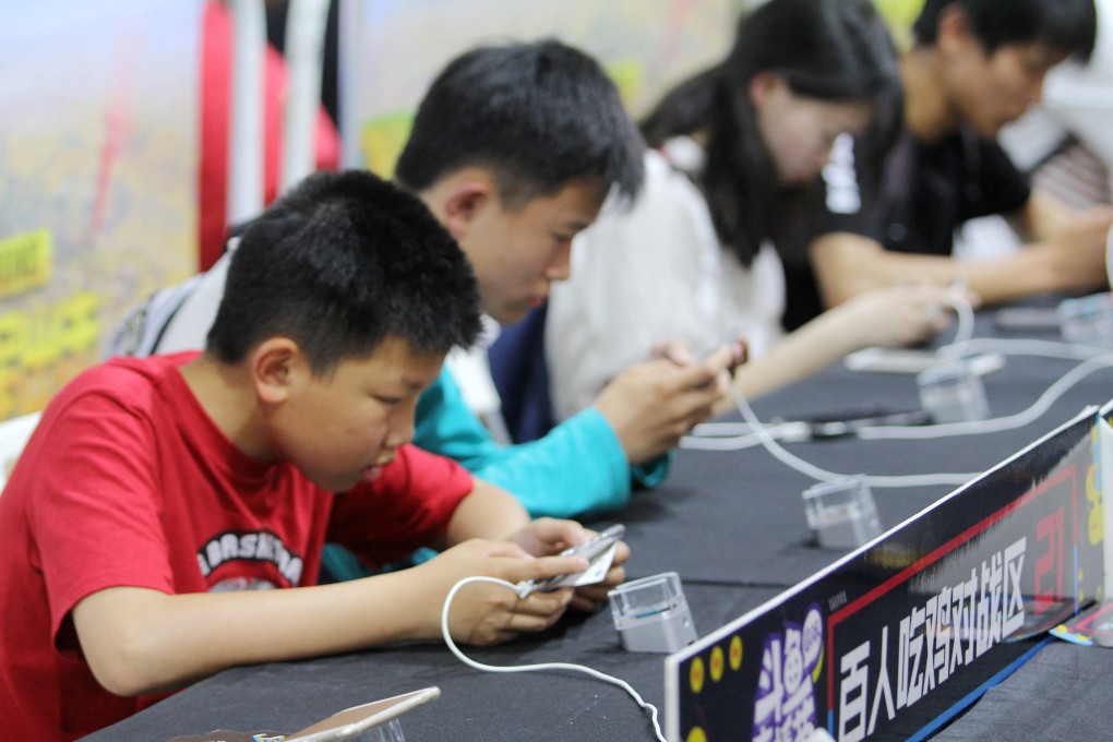 Kids compete in an Honour of Kings tournament in Wuhan in 2018. Photo: AFP