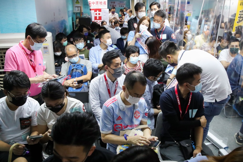 Buyers queuing up at the sales office of Wang On Properties in Mong Kok to bid for The Met.Azure development in Tsing Yi on August 14, 2021. As many as 13 buyers vied for each available unit. Photo: Edmond So