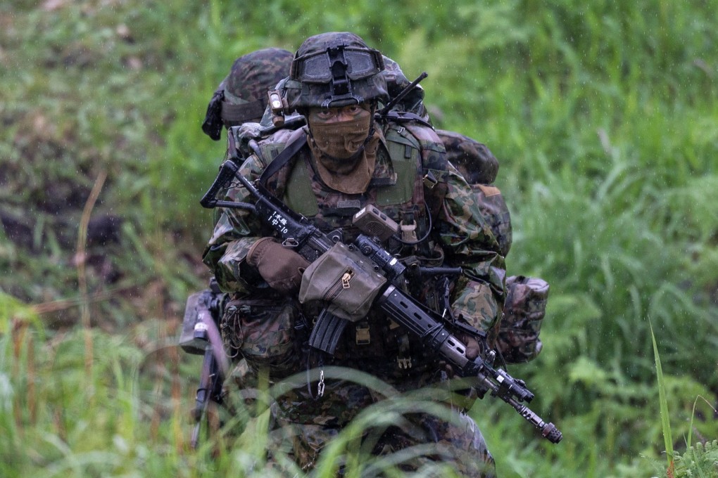 A Japanese soldier trains during a joint military drill with French and US forces. Photo: Reuters