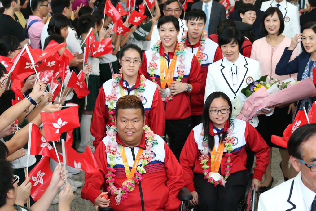 Hong Kong’s Rio 2016 Paralympic Games medallists (from left) Leung Yuk-wing, Justine Charissa Ng, Alison Yu Chui-yee, Tang Wai-lok and Chan Yui-chong arrive at Hong Kong International Airport in 2016. Photo: K. Y. Cheng