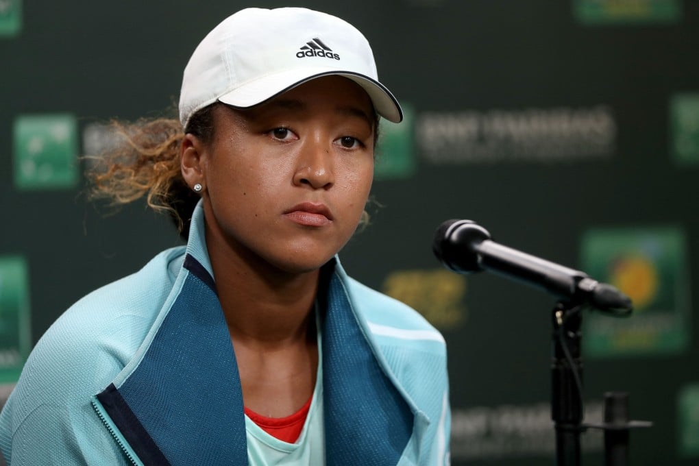Naomi Osaka of Japan fields questions from the media at a press conference during the BNP Paribas Open at the Indian Wells Tennis Garden in March 2019. Photo: AFP