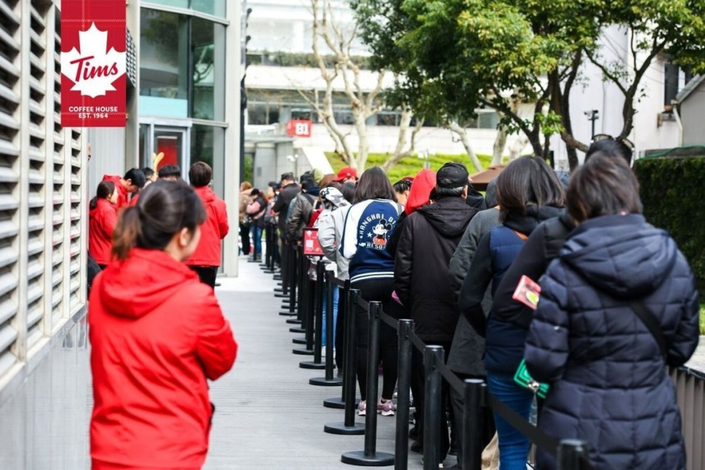 Customers queue up outside a Tim Hortons cafe in Shanghai. Photo: Handout